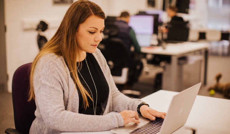 Woman at leased laptop