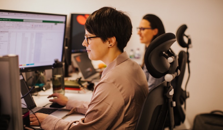 Woman working at a computer