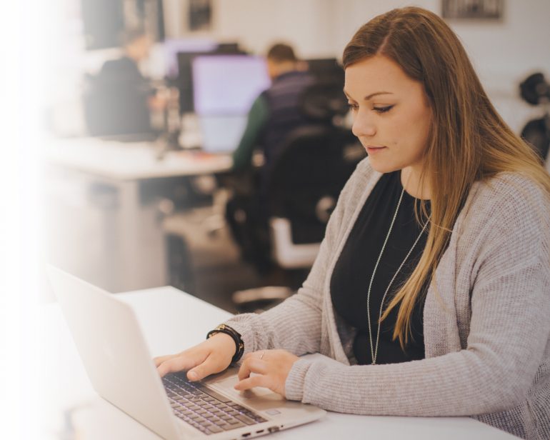 Woman at desk with computer