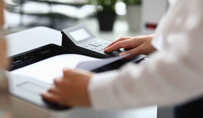 Person using a photocopier