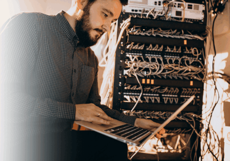 IT service engineer working in cabinet room