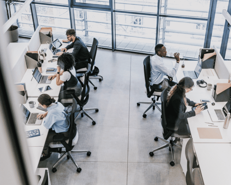 Corporate employees working in a modern office