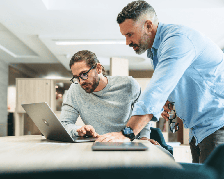 Modern Businessmen Working Together in a Modern Office Space